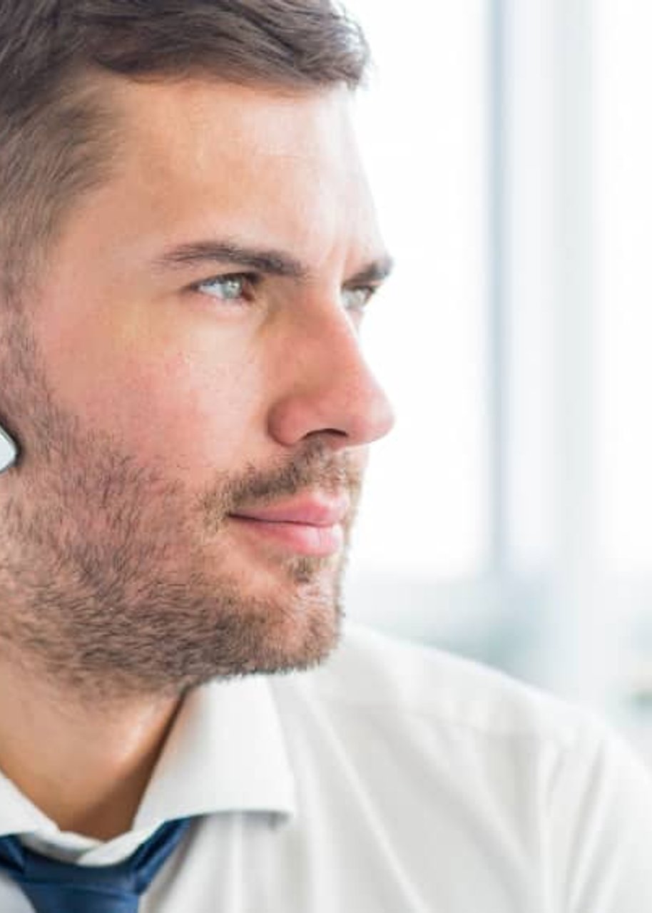 Security agent with earpiece in Orange County CA